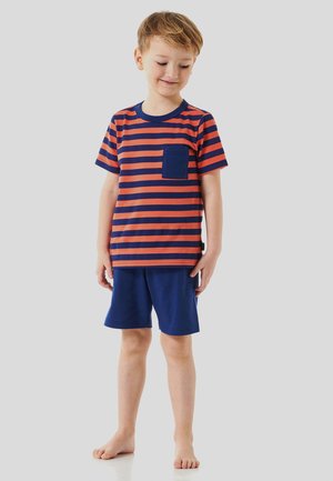 Red and navy striped t-shirt with a pocket, paired with solid navy shorts. Cotton fabric, relaxed fit, short sleeves, and above-knee length.