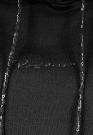 Black sweatshirt featuring a textured fabric, adjustable drawstrings with brand logo, and subtle stitched logo on the front.