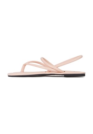 Infradito rosa con cinturini sottili e suola piatta; design minimalista con una soletta texturizzata e suola nera.