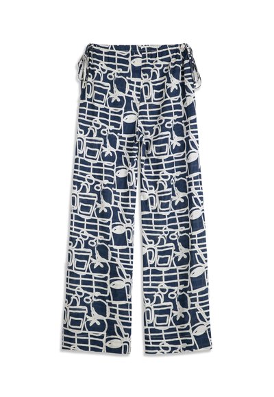 Granatowe spodnie o szerokich nogawkach z białym abstrakcyjnym wzorem linii i owoców, posiadające elastyczną talię i wiązania po bokach.