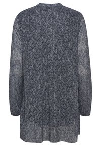 Langermige blouse in marineblauw met een delicate witte bloemenpatroon. Lichtgewicht, doorschijnende stof met een ontspannen pasvorm en een ronde zoom.