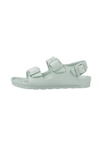 Ljusgrön, platt sandal i syntetmaterial med två justerbara remmar med spännen och en texturerad sula.