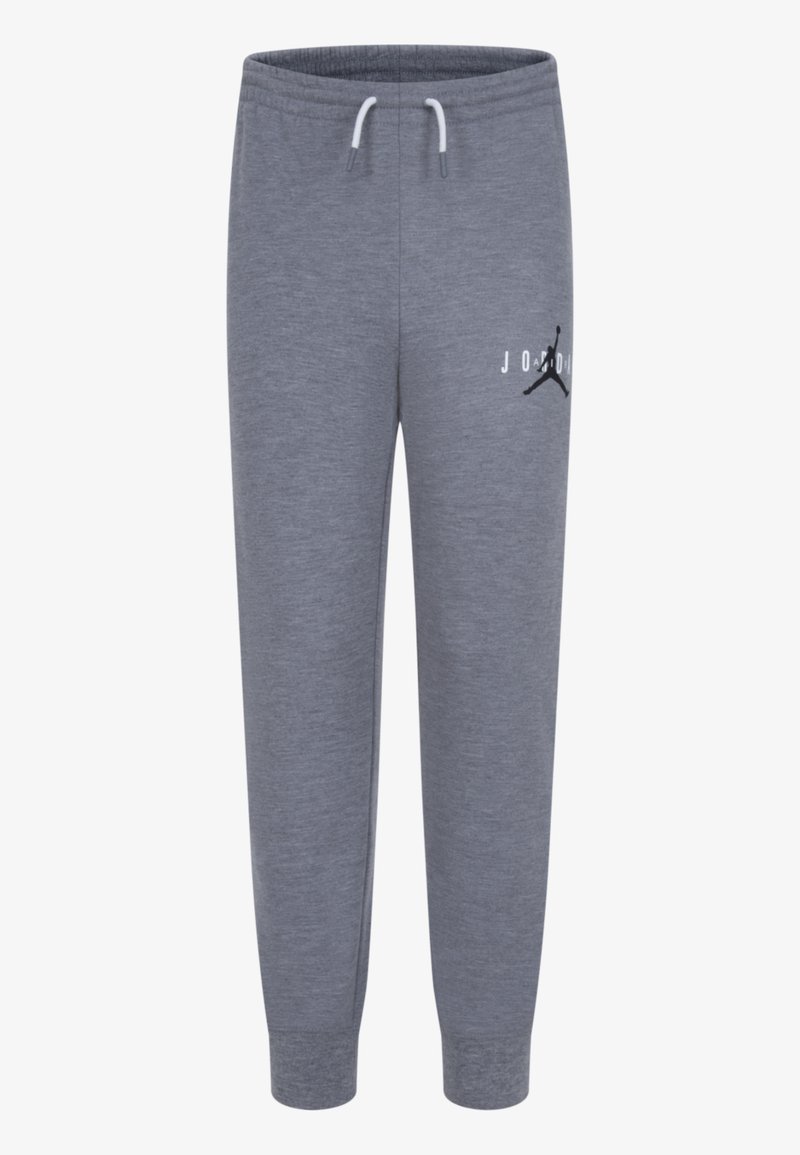 Grå joggebukser laget av mykt materiale, med snor i livet, avsmalnende ermer og et Jordan-logo trykt på venstre lår.