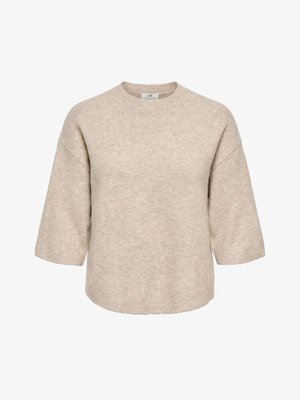 Pull en maille beige oversize avec épaules tombantes, manches mi-longues larges, col rond et base et poignets côtelés.