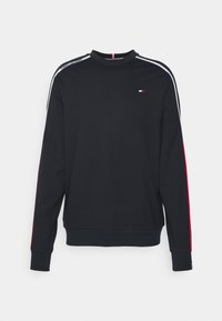 Felpa nera con maniche lunghe, scollo rotondo, strisce laterali bianche e rosse e un piccolo logo sul petto. Tessuto morbido e confortevole.