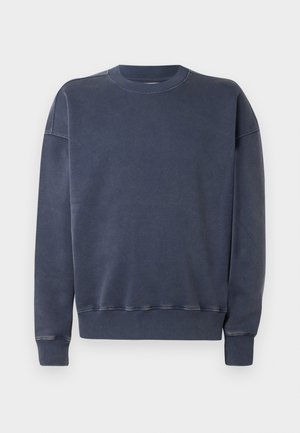 Sweatshirt bleumarin din amestec de bumbac, cu guler rotund, mâneci lungi și manșete și tiv din material elastic. Textură netedă cu detalii minime.