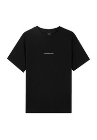 Zwart katoenen T-shirt met een ronde hals en korte mouwen. Centraal staat de witte tekst "TOMORROWLAND." Soepele textuur.