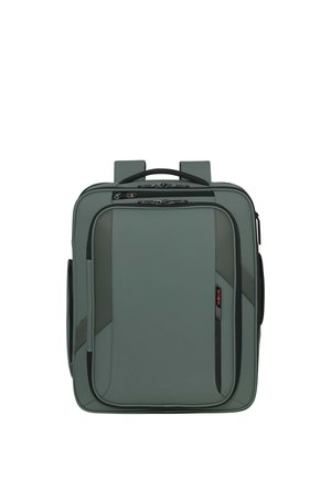 Kompakter grauer Soft-Rucksack mit Frontreißverschlusstasche, gepolstertem Griff und verstellbaren Schulterriemen.