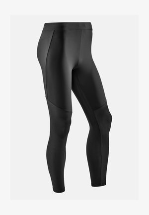 Schwarze Sportleggings mit glatter Oberfläche, ausgestattet mit strukturierten Netzpaneelen am Unterschenkel und einem hohen Taillenbund für zusätzlichen Halt.