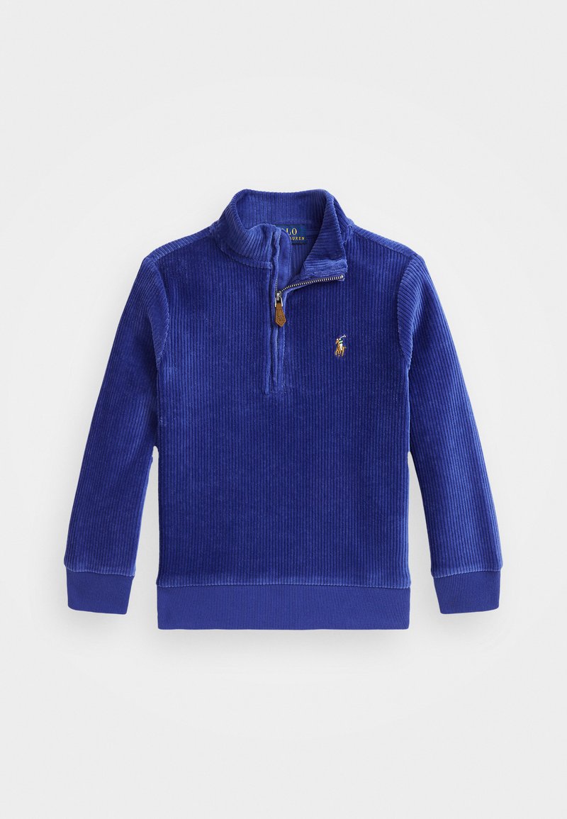 Pólder azul de corduroy con cuello de cremallera, que presenta un pequeño logotipo en el pecho. Puños y dobladillo acanalados, tejido suave y texturizado.