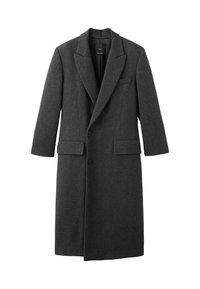 Palton din lână gri închis, cu revere ascutite, două buzunare frontale și închidere cu un singur nasture. Croială dreaptă, cu mâneci lungi.