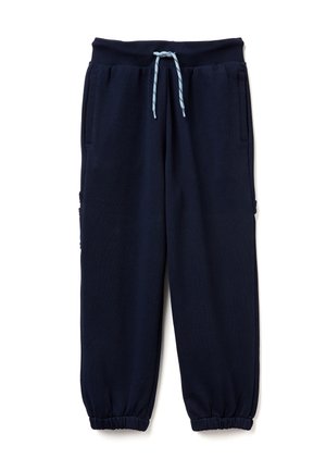 Marineblauwe sweatpants van zachte stof. Voorzien van een elastische tailleband met een blauwe koord, zijzakken en taps toelopende boorden.