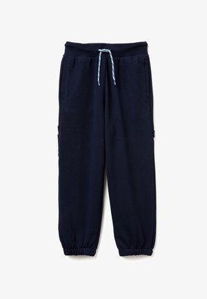 Marineblauwe sweatpants van zachte stof. Voorzien van een elastische tailleband met een blauwe koord, zijzakken en taps toelopende boorden.