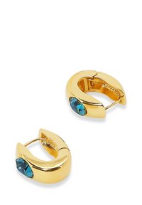 Goldene Creolen mit einem Akzent aus türkisem Edelstein. Glatte Oberfläche, abgerundetes Design und sichere Verschlussmechanik. Leicht und mit metallic Finish.