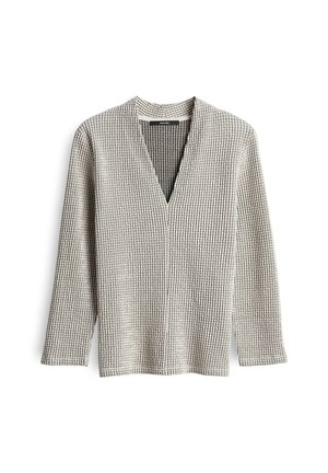 Long-sleeve beige knit cardigan with small checkered pattern, V-neck, and no buttons or visible fasteners.