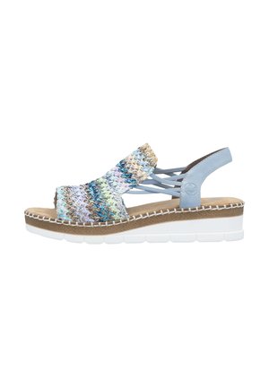 Woven multicolor sandals with a blue leather back strap, cork sole, and white platform. Features crisscrossed elastic bands on the upper.