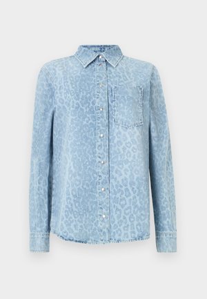 Gaiši zila džinsa krekls ar leoparda printa rakstu, apkakle, gari piedurknes, pogām aiztaisāma un krūšu kabata. Teksturēta apdare.