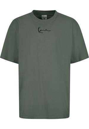T-shirt din bumbac de culoare verde măslin, cu mâneci scurte, decolteu rotund și logo-ul brodat „Kane” de culoare neagră pe piept. Textură netedă, croi lejer.