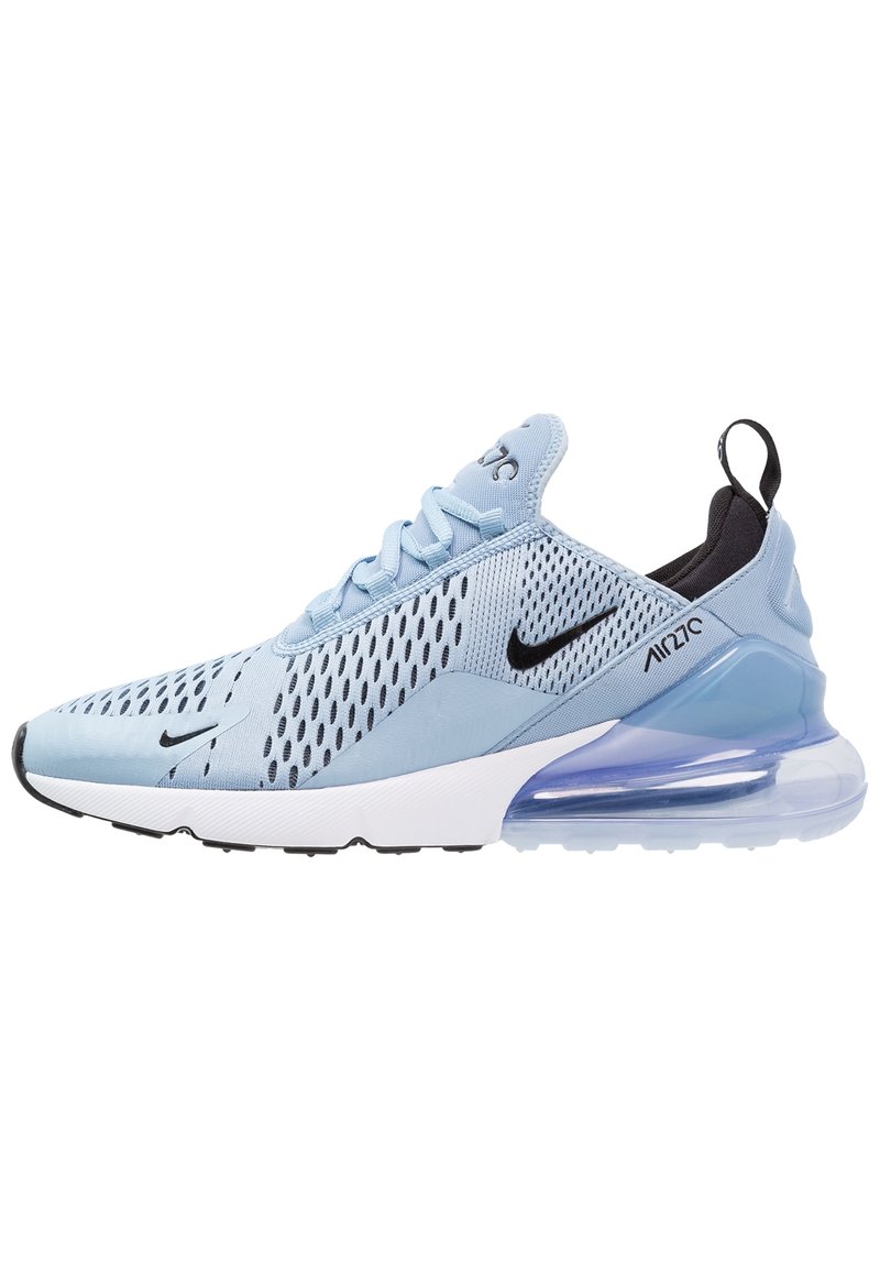 Light blue athletic sneakers with mesh upper, black accents, and a visible air unit in the heel. Features a lace-up design and textured patterns.