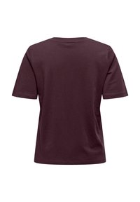 T-shirt a maniche corte color bordeaux con collo rotondo e vestibilità rilassata. Realizzato in morbido cotone, senza fantasie o dettagli sul retro.