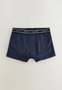 Boxers bleu marine pour homme avec ceinture élastique noire affichant le logo "NEXT" répété en texte blanc, posés à plat sur fond gris clair.