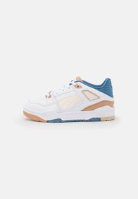 White leather sneaker with beige and light blue accents, textured panels, a cushioned sole, and contrasting rubber outsole.