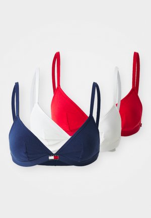 Drie bh's in een navy, witte en rode katoenmix. Driehoeksvorm met dunne bandjes. Opmerkelijke logo-detail in het midden van de navy bh.