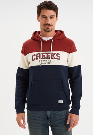 Capuchon sweatshirt met rode, crème en marine kleurvakken. Heeft een voorkant pocket, trekkoord en tekst van het merklogo op de borst. Katoenmengsel stof.