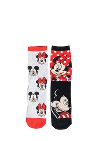 Calzini a tema Disney con un lato grigio decorato da facce di Minnie Mouse e un lato rosso con una grande Minnie Mouse e pois, con dettagli neri.
