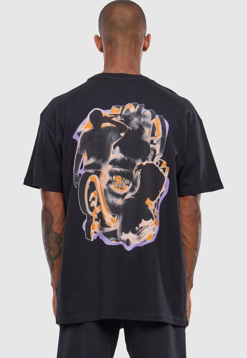 Black cotton t-shirt featuring a colorful graphic print on the back, showcasing abstract human silhouettes with orange and purple accents.