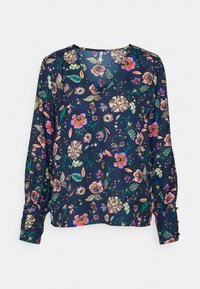Blusa azul marinho com estampado floral vibrante em várias cores. Mangas longas com punhos franzidos. Tecido leve e suave com um corte descontraído.