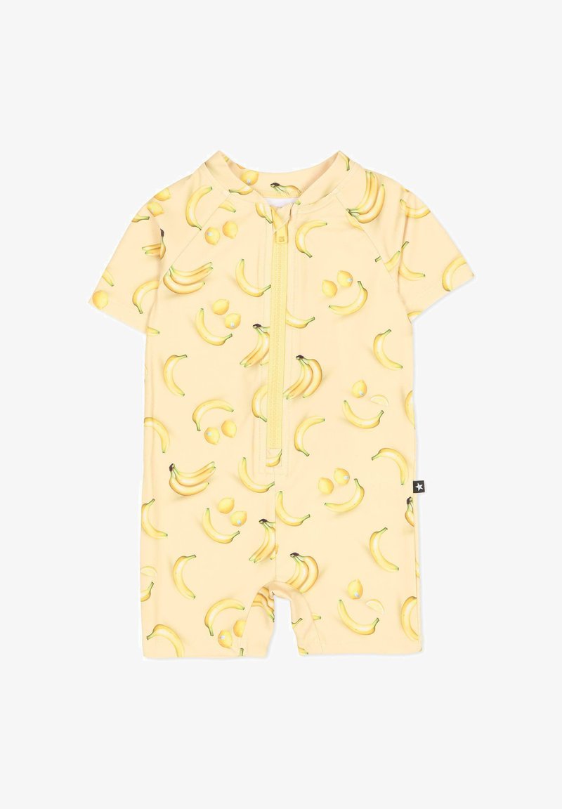 Geel kortemouwen rompertje met een banaan- en citroenpatroon, voorzien van een ritssluiting aan de voorkant en een label aan de onderzijde.