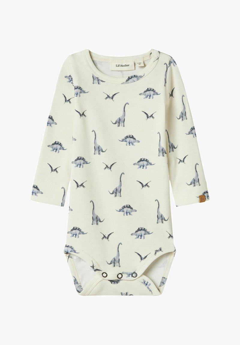 Gaišas krēmkrāsas bodijs ar garām piedurknēm, kurā redzami dinozauru un pterosauru zīmējumi pelēkās krāsās, ar spiedpogu aizdarēm apakšā.