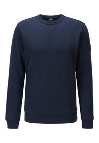 Sudadera azul marino hecha de una suave mezcla de algodón, con cuello redondo, mangas largas, puños acanalados y un discreto parche de logo en la manga.
