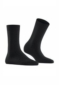 Schwarze Socken mit strukturiertem Design, einem gerippten Bund sowie verstärkter Zehen- und Fersenpartie. Das Design weist ein Rautenmuster für zusätzliche Details auf.