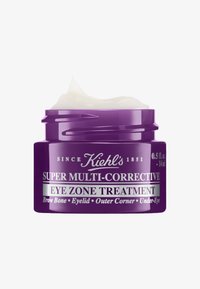 Lila Glas mit einer weißen Creme, beschriftet mit "Super Multi-Korrektur Augenbereichsbehandlung" in silberner Schrift. Füllmenge von 0,5 fl oz (14 ml).