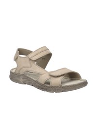 Beżowe skórzane sandały z regulowanymi paskami, otwartymi bokami, teksturowaną podeszwą i wzmocnionymi szwami. Lekki i codzienny design.