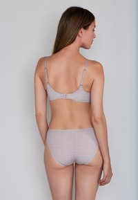 Light gray bra and matching panties with a geometric pattern. Adjustable straps and a hook closure. Soft, smooth fabric texture.