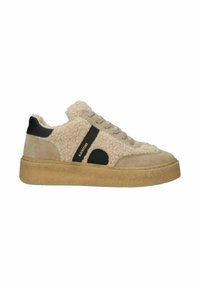 Beige suede sneakers with textured fluffy panels, black accents, and a light rubber sole. Laces at the front and branding on the side.