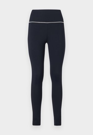 Navy fitted leggings made of stretchy fabric, featuring a wide waistband with a reflective trim along the top for visibility.