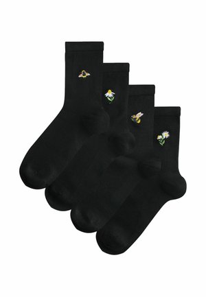 Black socks featuring assorted embroidered designs: bees and flowers. Each sock has a ribbed cuff and a smooth texture. Four pairs included.