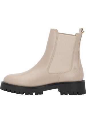 Bottes de cheville en cuir beige avec des panneaux latéraux élastiques, une pointe arrondie, et une semelle en caoutchouc noir texturé avec des rainures profondes pour l'adhérence.