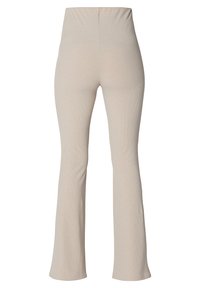 Beige gerippte Schlaghosen mit hohem Bund. Der Stoff hat eine weiche Textur und einen dezenten Stretch, geeignet für Freizeit- oder Sportbekleidung.