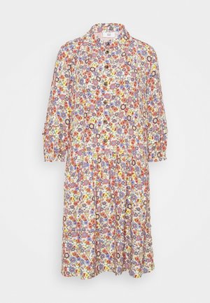 Robe midi à manches longues avec fermeture boutonnée à l'avant, col pointu, et motif floral multicolore dans des tons de violet, jaune, rouge et blanc.