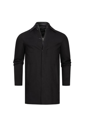 Cappotto nero con un design strutturato, dotato di chiusura con zip, due tasche laterali e maniche corte. Realizzato in un tessuto liscio.