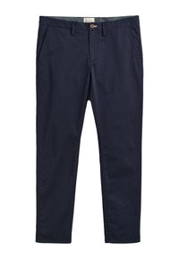 Navy chinos yang menampilkan penutupan kancing, kantong samping, dan tekstur halus, terbuat dari katun ringan. Potongan yang disesuaikan dengan garis yang bersih.