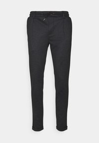 Pantalons fuselés gris foncé en tissu texturé, avec taille élastique et cordon de serrage. Comprend deux poches avant et des ourlets roulés.