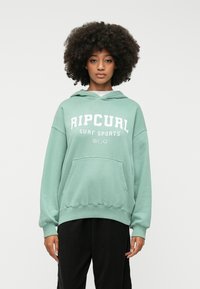 Muntgroene hoodie van zachte stof, met een grote voorkrui pocket, ribbelmanchetten en de tekst "RIPCURL SURF SPORTS" in het wit.