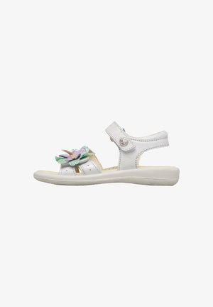 Sandalo bianco per bambini con cinturino regolabile alla caviglia e decorazione floreale pastello sulla fascia frontale superiore.