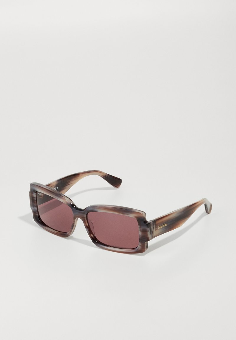 Square-shaped sunglasses with a marbled brown plastic frame and dark pink lenses. Features subtle gold branding on one arm.
